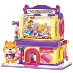 Adorable street scenery playfully indulges a dog: Corgi playing with a spinning egg toy.
