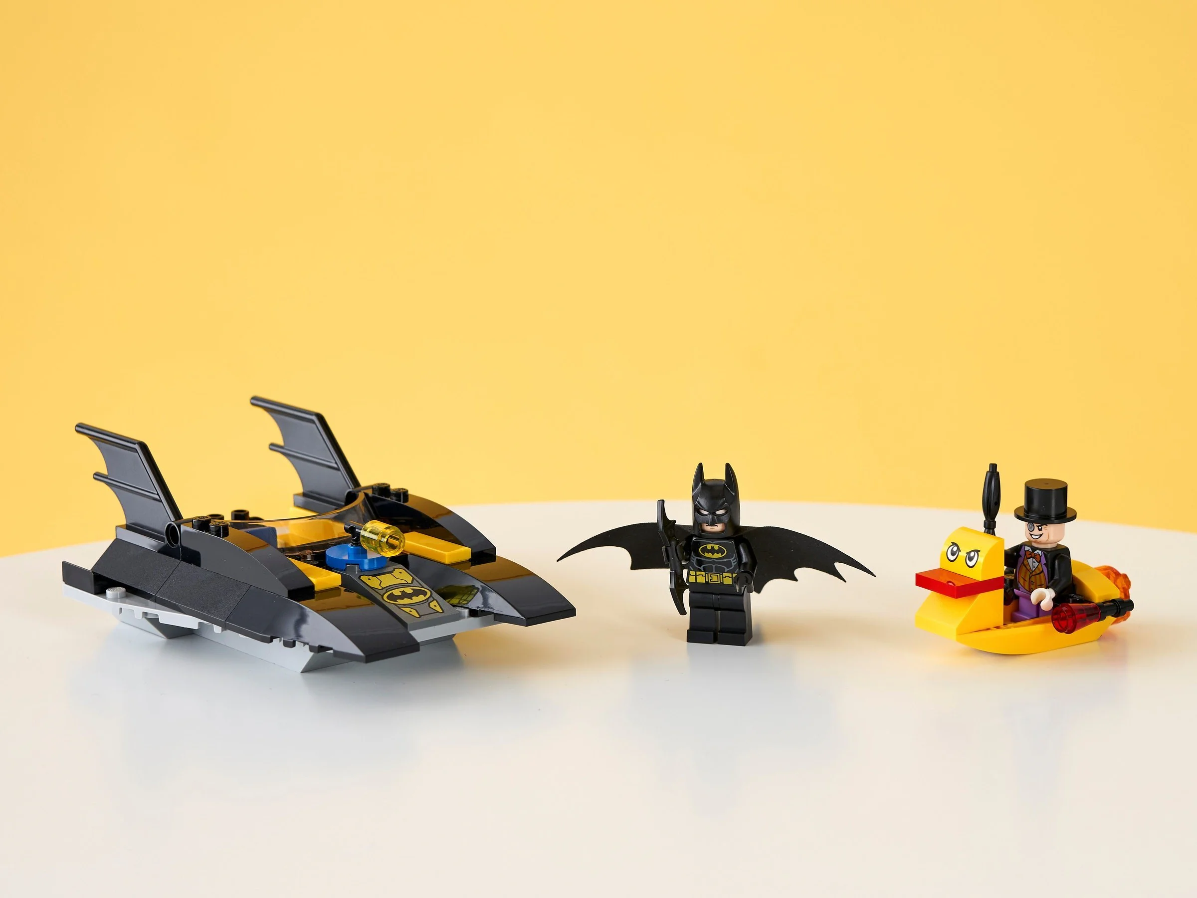 Batboat chases penguins. 11565 image 2