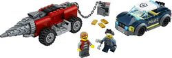 Elite police pursue a drilling vehicle.