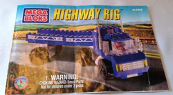 Highway gantry-mounted semi-trailer truck.