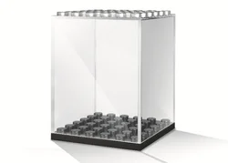 Human-sized transparent plastic box.